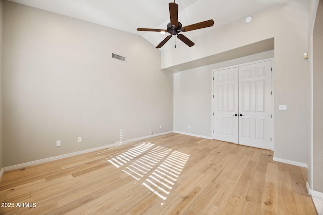 11816 E Terra Dr, Scottsdale, AZ 85259 - unfurnished bedroom featuring light wood finished floors, lofted ceiling, a closet, and a ceiling fan