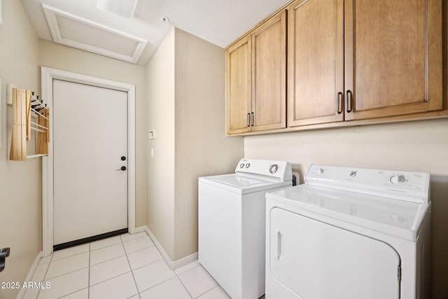 11816 E Terra Dr, Scottsdale, AZ 85259 - laundry room with washing machine and dryer, cabinet space, and light tile patterned flooring