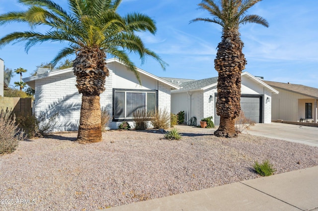 single story home with a garage