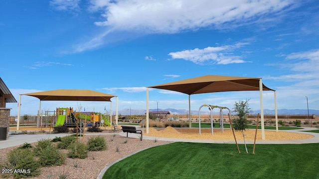 3322 E Valleyhigh Trl, San Tan Valley, AZ 85143 - communal playground featuring a mountain view and a lawn