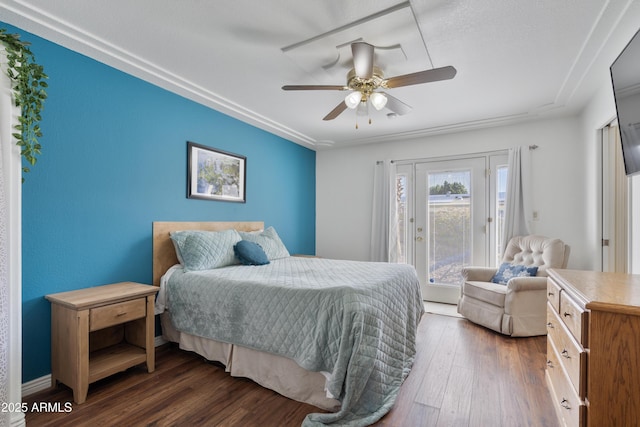 bedroom featuring hardwood / wood-style floors, ceiling fan, and access to outside