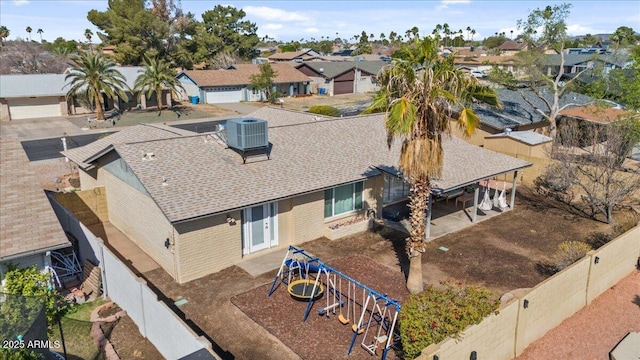 birds eye view of property with a residential view