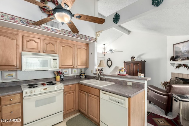 kitchen with lofted ceiling with beams, a sink, a textured ceiling, white appliances, and a peninsula