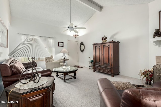 living room featuring beam ceiling, light colored carpet, ceiling fan, and a textured ceiling