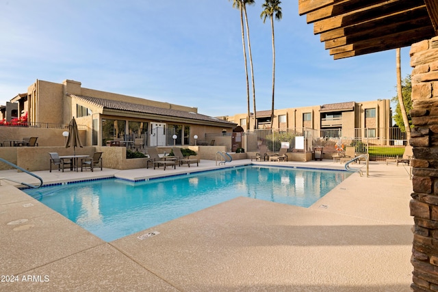 view of pool featuring a patio