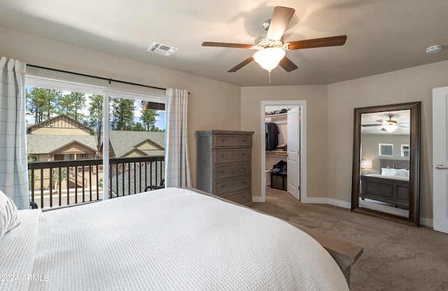 bedroom with access to exterior, ceiling fan, a closet, and carpet floors