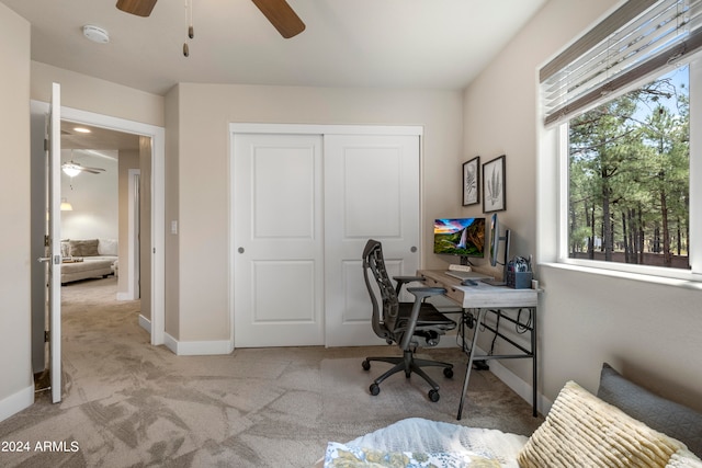 office featuring light colored carpet and ceiling fan