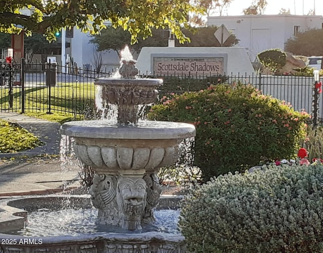 view of property's community with fence