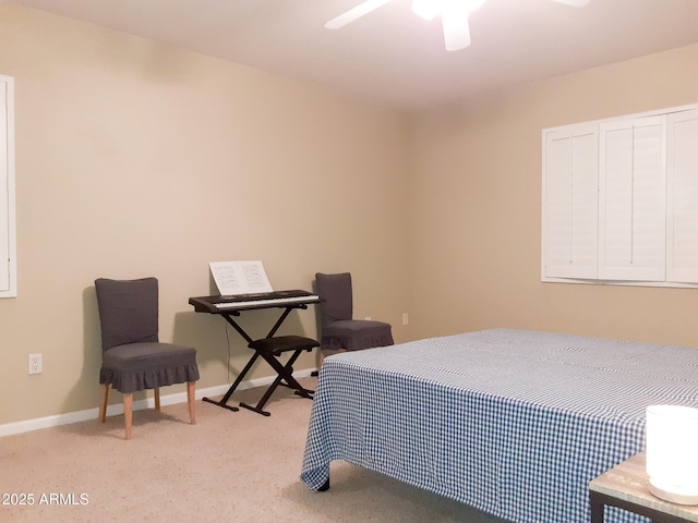bedroom featuring carpet floors, baseboards, and ceiling fan