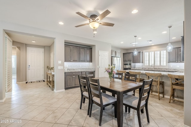 dining room featuring recessed lighting, light tile patterned flooring, ceiling fan, and baseboards