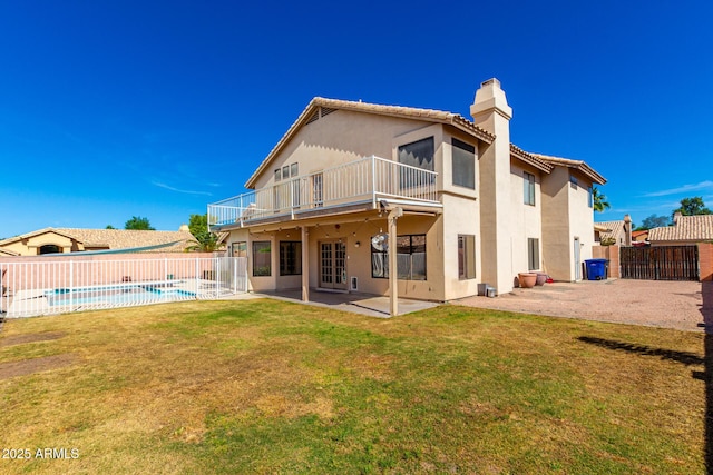 3761 W Kent Dr, Chandler, AZ 85226 - rear view of property featuring stucco siding, a fenced in pool, a chimney, a patio area, and fence private yard