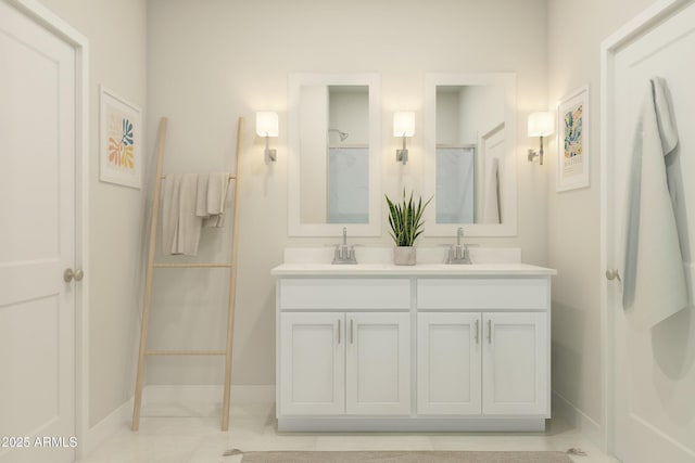 bathroom with vanity and a shower