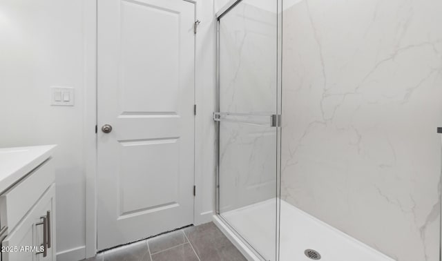 bathroom with vanity and an enclosed shower