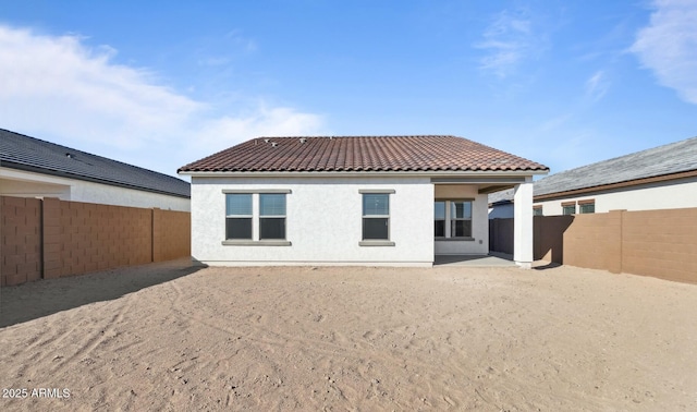 rear view of property with a patio