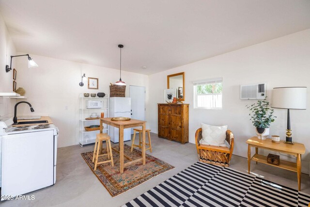 905 E Coronado Rd, Phoenix, AZ 85006 - dining area featuring a wall unit AC and washer / dryer