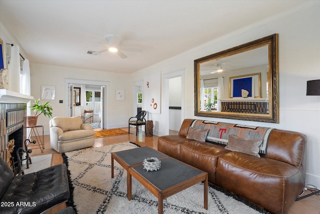 905 E Coronado Rd, Phoenix, AZ 85006 - living area with a ceiling fan, plenty of natural light, and a fireplace
