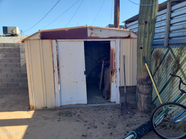 view of outbuilding with central air condition unit