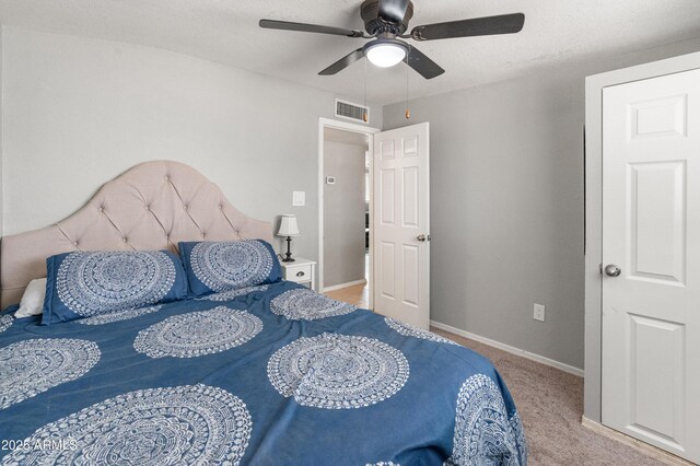 3806 N 64th Dr, Phoenix, AZ 85033 - bedroom with baseboards, carpet, and a ceiling fan