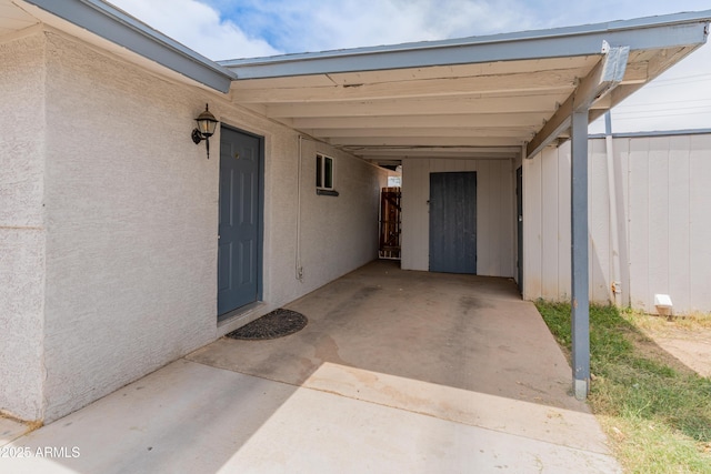 3806 N 64th Dr, Phoenix, AZ 85033 - view of patio featuring an attached carport and fence