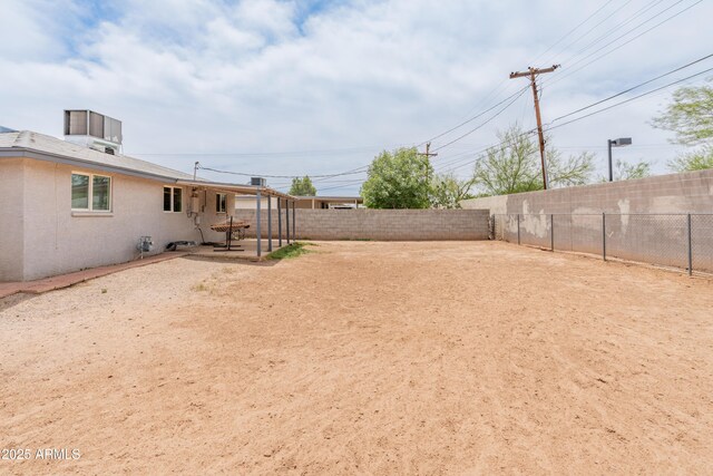 3806 N 64th Dr, Phoenix, AZ 85033 - fenced backyard with a patio