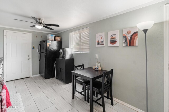 3806 N 64th Dr, Phoenix, AZ 85033 - dining area featuring a ceiling fan, ornamental molding, and baseboards