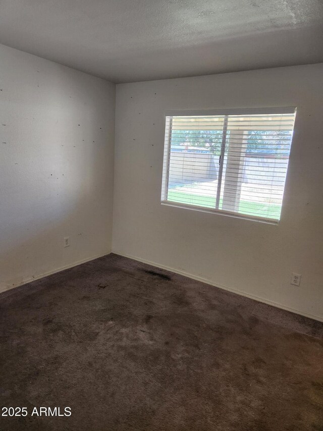 3329 W Ross Ave W, Phoenix, AZ 85027 - spare room with carpet and baseboards
