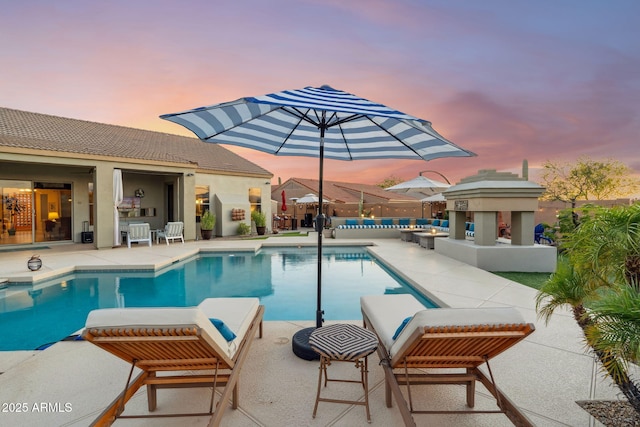 view of pool with a patio area and an outdoor hangout area