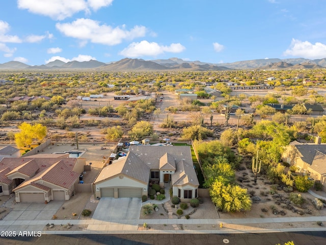 aerial view of residential area with mountains