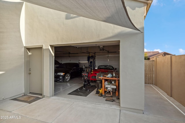 garage with fence