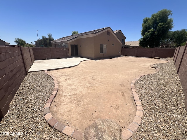 13004 W Saint Moritz Ln, El Mirage, AZ 85335 - fenced backyard with a patio