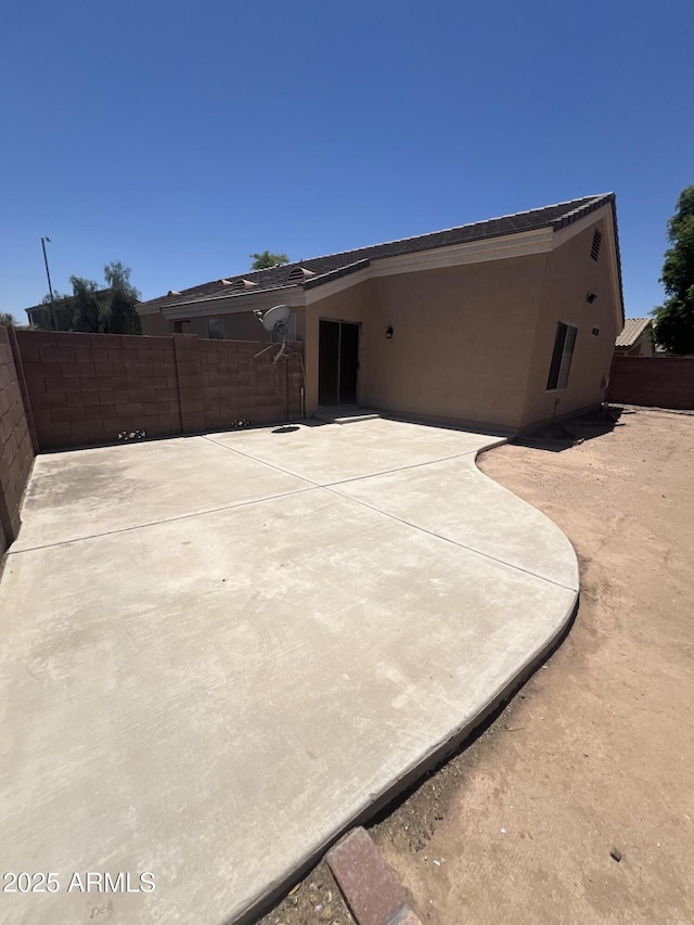 13004 W Saint Moritz Ln, El Mirage, AZ 85335 - back of property featuring a patio area and stucco siding