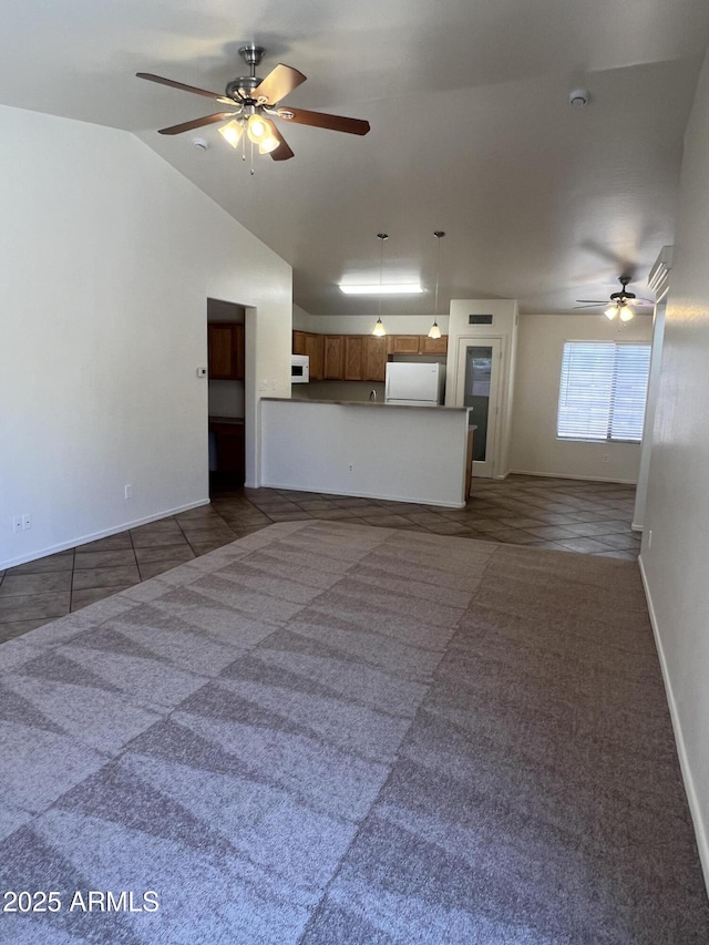 13004 W Saint Moritz Ln, El Mirage, AZ 85335 - unfurnished living room featuring ceiling fan, dark colored carpet, and lofted ceiling