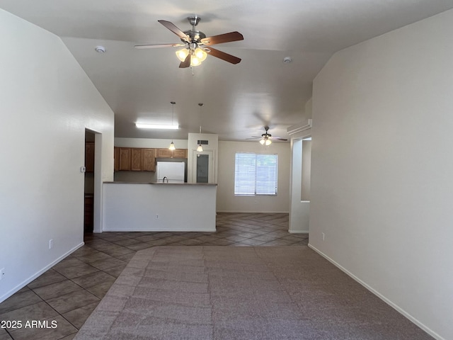 13004 W Saint Moritz Ln, El Mirage, AZ 85335 - unfurnished living room with a ceiling fan, vaulted ceiling, and tile patterned flooring