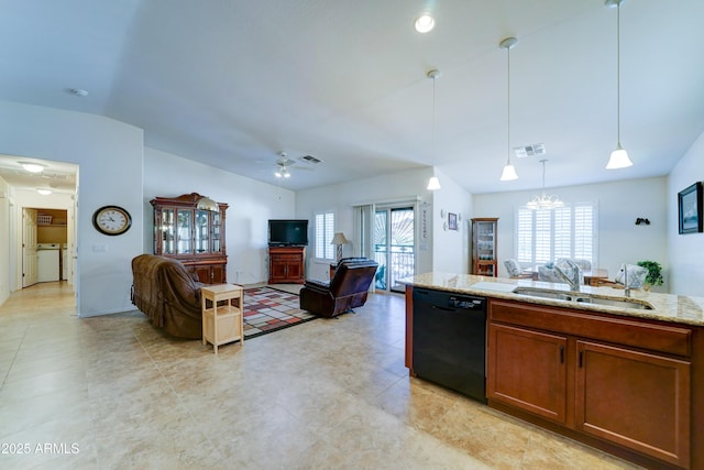 kitchen with visible vents, dishwasher, light stone counters, independent washer and dryer, and a sink