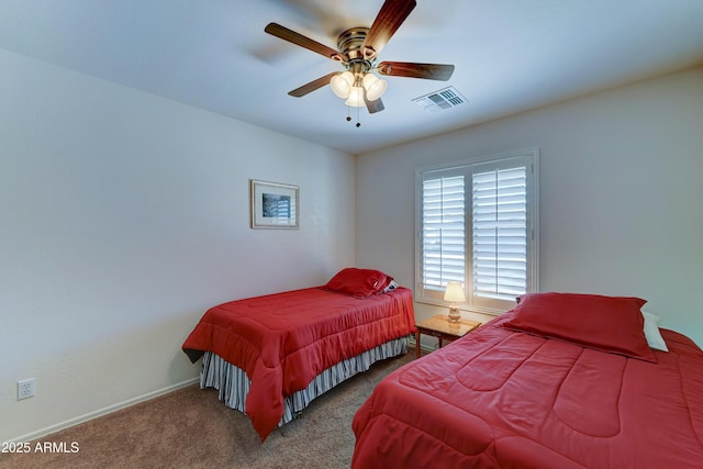 bedroom with visible vents, baseboards, a ceiling fan, and carpet flooring