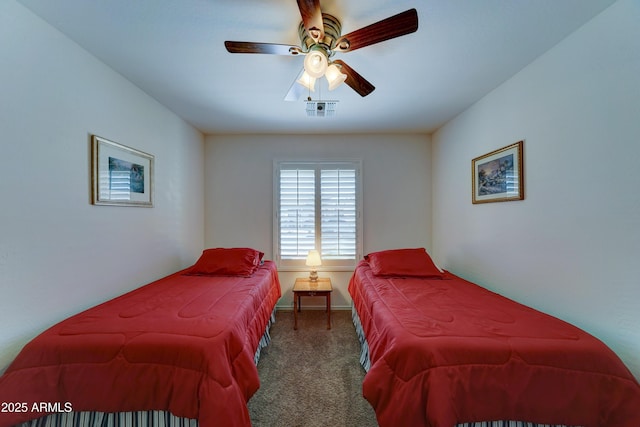 bedroom featuring visible vents, carpet floors, and ceiling fan