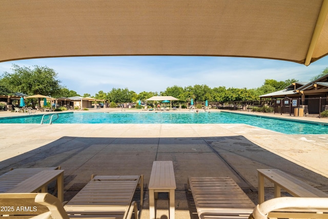 4140 E Claxton Ave, Gilbert, AZ 85297 - community pool featuring a patio area