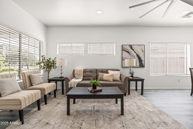 4140 E Claxton Ave, Gilbert, AZ 85297 - living room featuring a ceiling fan, wood finished floors, baseboards, and recessed lighting