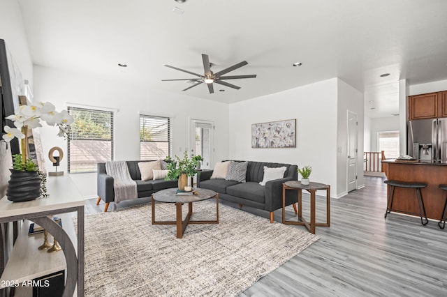 4140 E Claxton Ave, Gilbert, AZ 85297 - living area with healthy amount of natural light, a ceiling fan, light wood-type flooring, baseboards, and recessed lighting