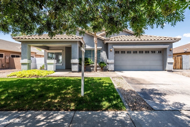 4140 E Claxton Ave, Gilbert, AZ 85297 - view of front of home with a garage, stucco siding, concrete driveway, and a tiled roof