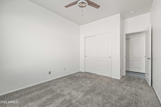4140 E Claxton Ave, Gilbert, AZ 85297 - unfurnished bedroom with carpet, baseboards, a closet, and a ceiling fan