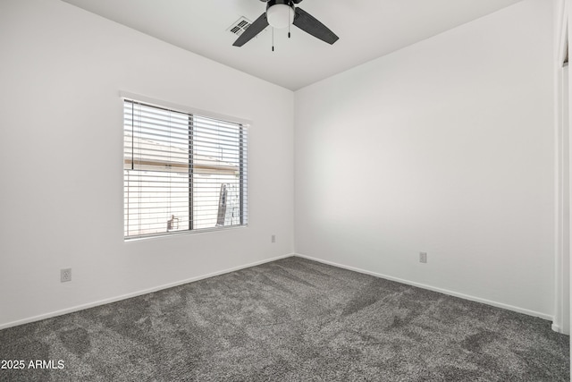 4140 E Claxton Ave, Gilbert, AZ 85297 - unfurnished room featuring dark colored carpet, a ceiling fan, and baseboards