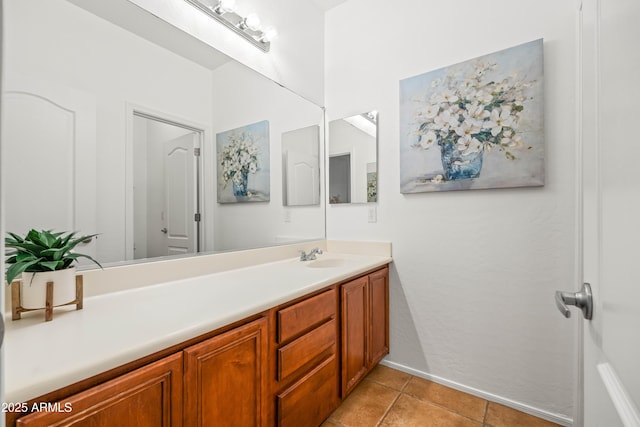 4140 E Claxton Ave, Gilbert, AZ 85297 - bathroom with vanity, tile patterned floors, and baseboards