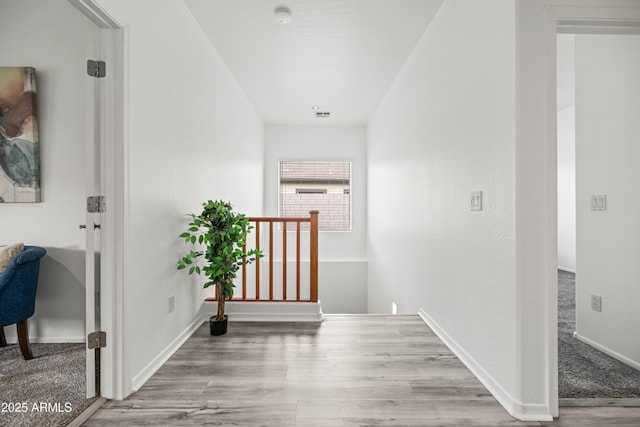 4140 E Claxton Ave, Gilbert, AZ 85297 - hall with wood finished floors and baseboards