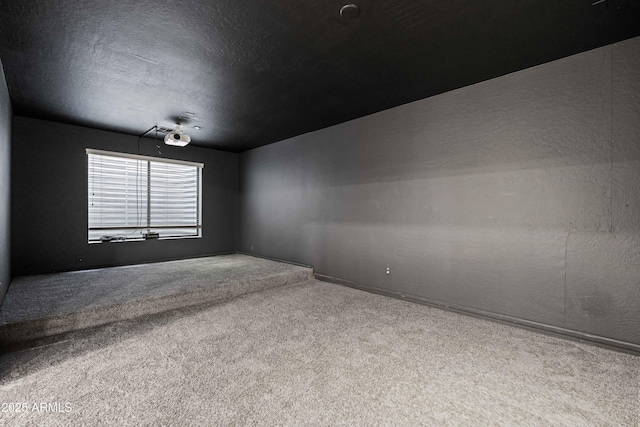 4140 E Claxton Ave, Gilbert, AZ 85297 - spare room with carpet flooring, baseboards, and a textured ceiling