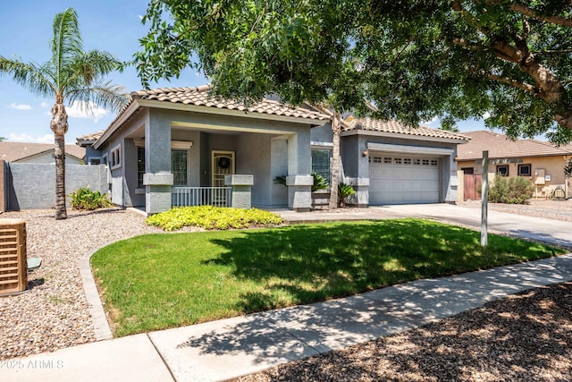 4140 E Claxton Ave, Gilbert, AZ 85297 - view of front of property with stucco siding, driveway, a tile roof, an attached garage, and covered porch