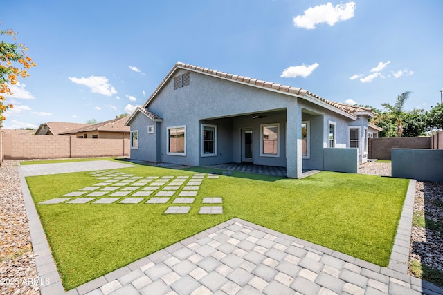 4140 E Claxton Ave, Gilbert, AZ 85297 - back of house featuring a patio, stucco siding, ceiling fan, and a tiled roof