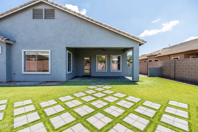 4140 E Claxton Ave, Gilbert, AZ 85297 - rear view of house featuring a ceiling fan, a patio area, and stucco siding