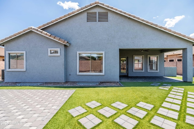 4140 E Claxton Ave, Gilbert, AZ 85297 - rear view of property with a ceiling fan, a patio area, and stucco siding
