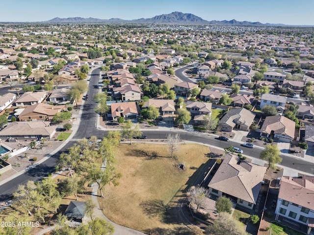 birds eye view of property featuring a mountain view and a residential view